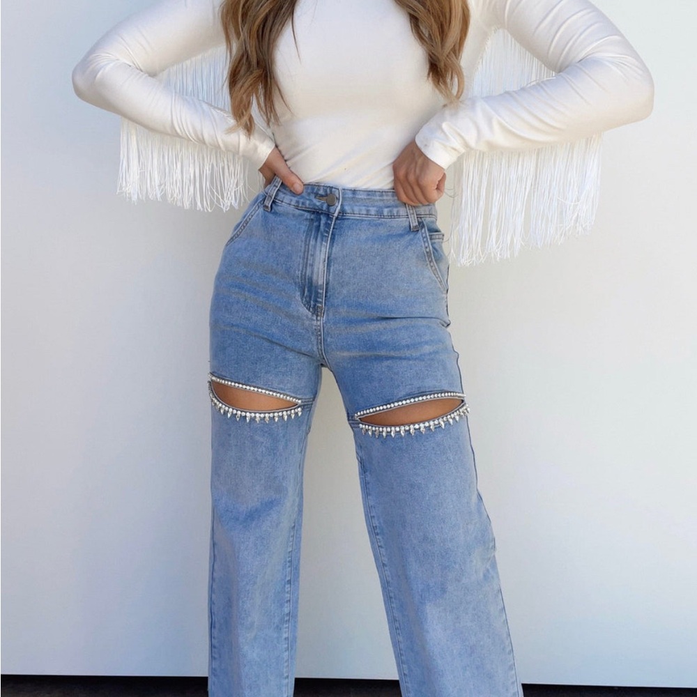 Blue Flare Jeans with Artistic Cutouts
